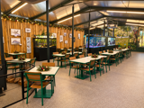 Christmas Ready Cafe With Subtle Tabletop Greenery